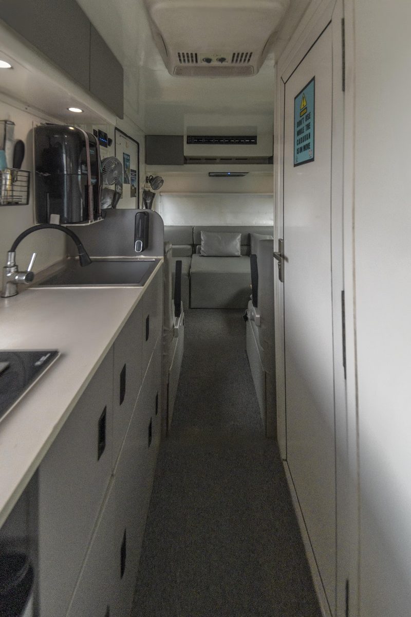 The Explorer interior corridor connecting living and sleeping areas