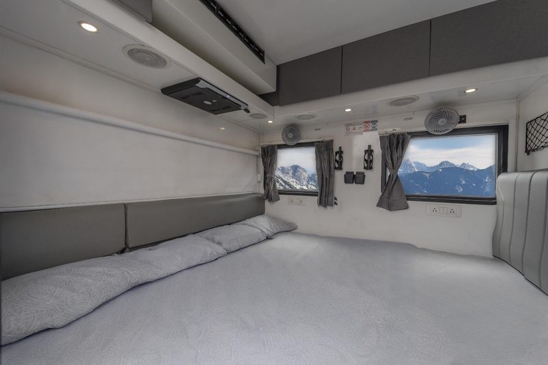 Queen-size bed inside The Explorer caravan