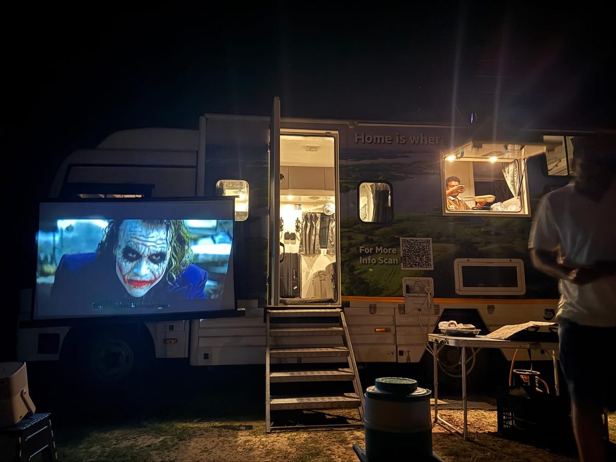 Outdoor movie night beside The Explorer